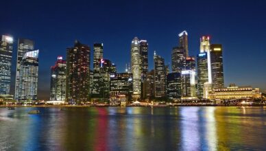 Singapore skyline at night with illuminated cityscape